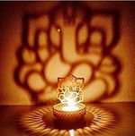 Creation Hub Premium Home Decorative Shadow Ganesh Ji Metal Tea Light Holder (8 cm x 8 cm x 11 cm, Brown)